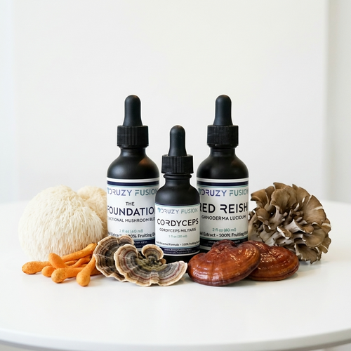 Three black dropper bottles with labels on a white surface with mushrooms and roots.